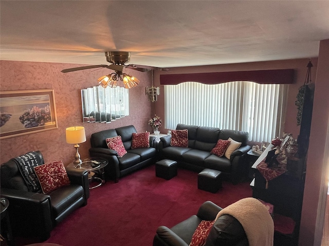 carpeted living room featuring ceiling fan and a healthy amount of sunlight