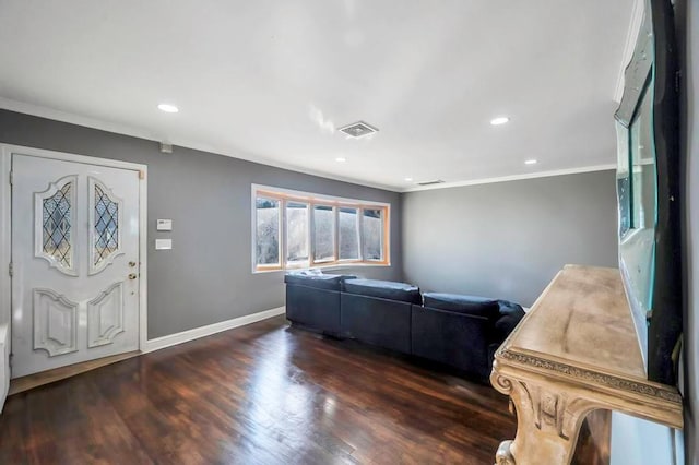 entryway featuring crown molding and dark wood-type flooring