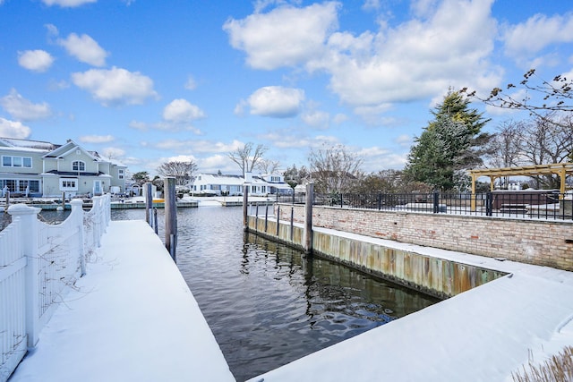 dock area featuring a water view