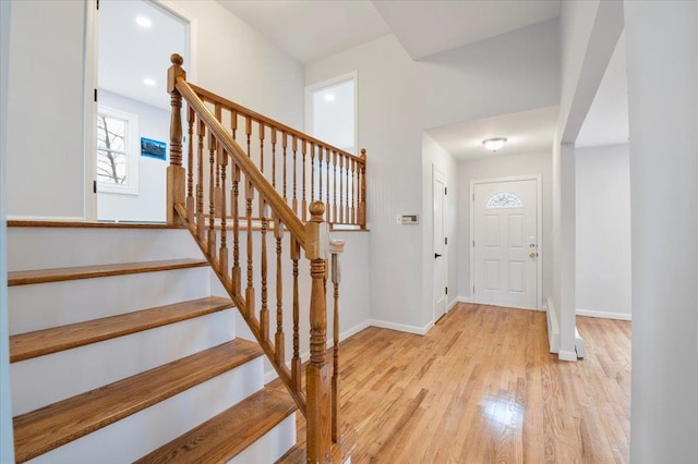 entrance foyer with light hardwood / wood-style floors