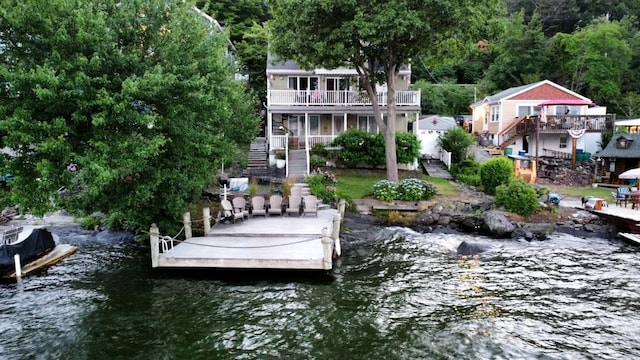 dock area with a deck with water view