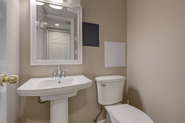 bathroom featuring sink and toilet