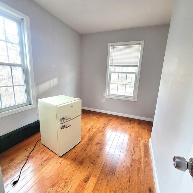 empty room featuring light hardwood / wood-style floors