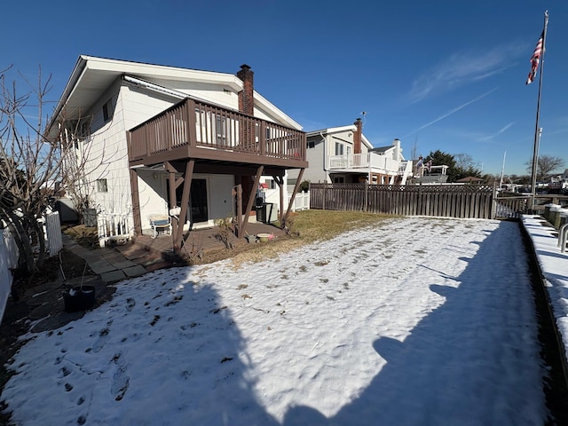 exterior space featuring a patio area and a wooden deck