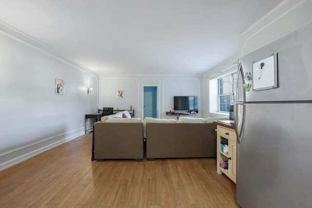 living room with light hardwood / wood-style floors