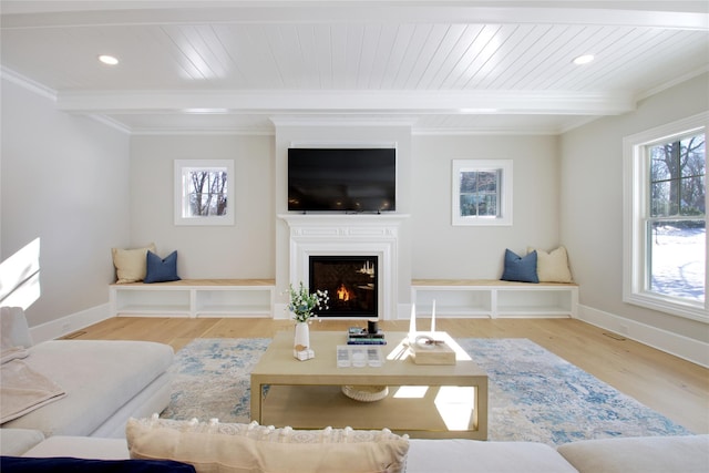 living room with beamed ceiling, wooden ceiling, and light hardwood / wood-style floors