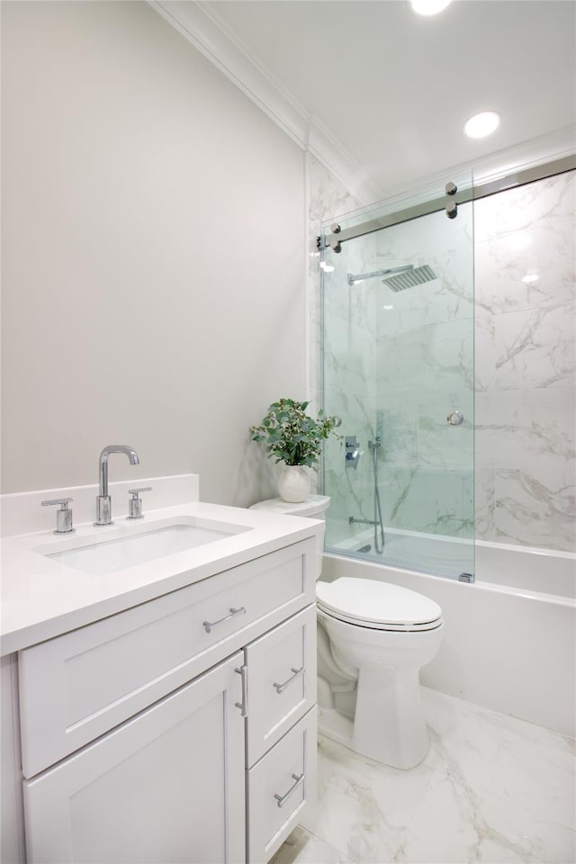 full bathroom with toilet, ornamental molding, vanity, and shower / bath combination with glass door