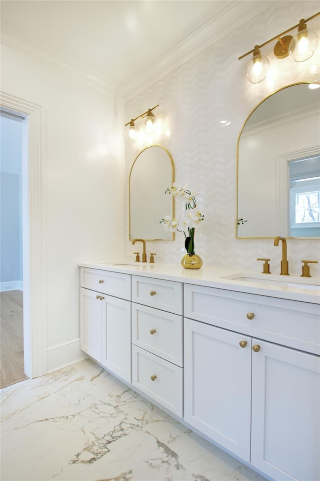 bathroom with vanity and ornamental molding