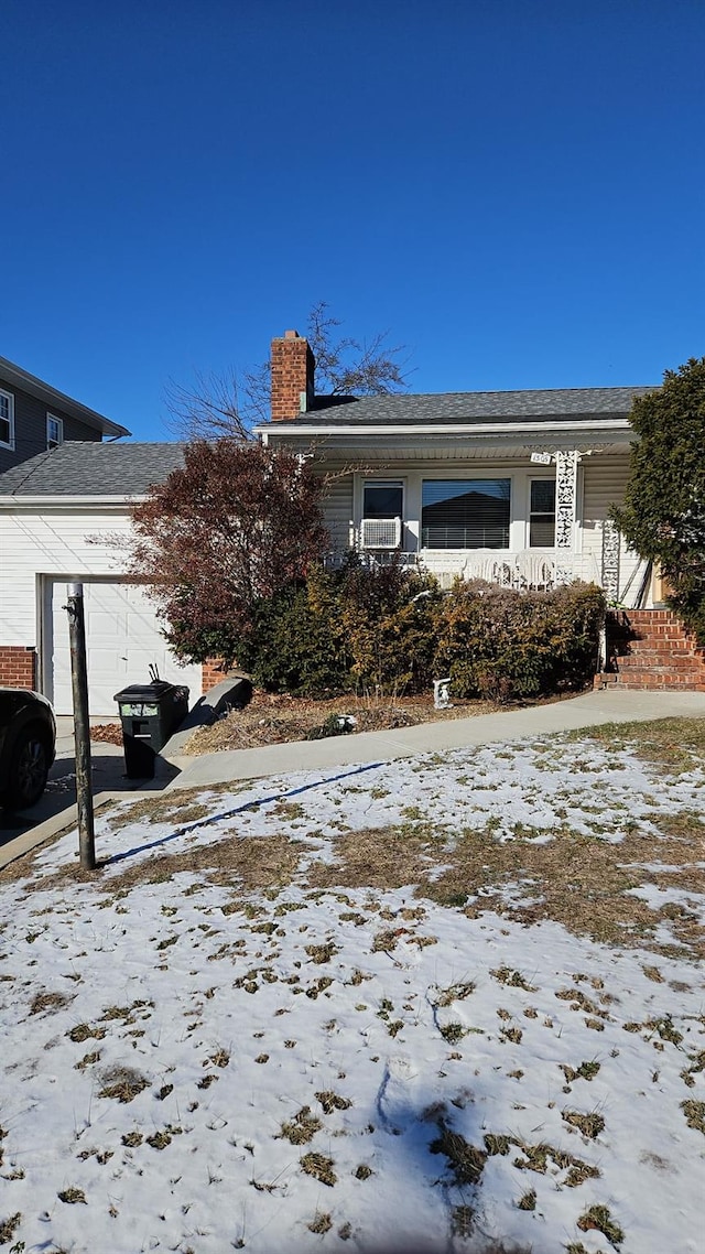 view of snow covered property