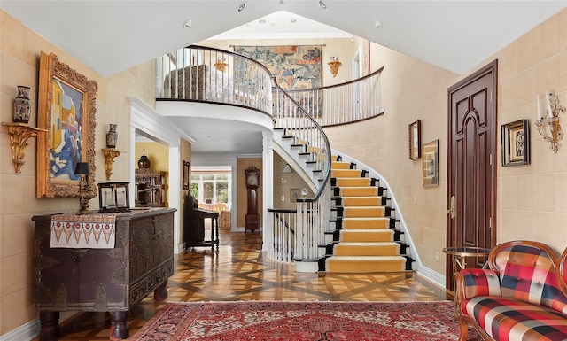 entrance foyer with parquet floors and ornamental molding