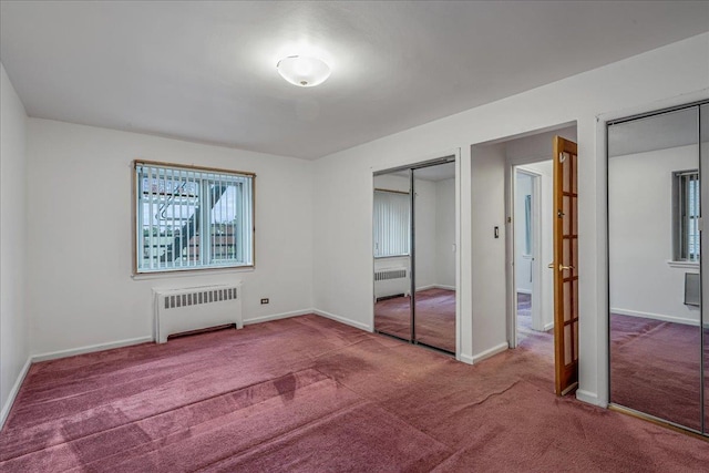 144-55Melbourne Ave 2F, Flushing, NY 11367 - unfurnished bedroom with radiator heating unit and carpet