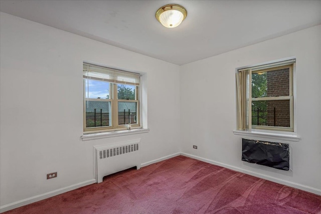 144-55Melbourne Ave 2F, Flushing, NY 11367 - unfurnished room with radiator and carpet