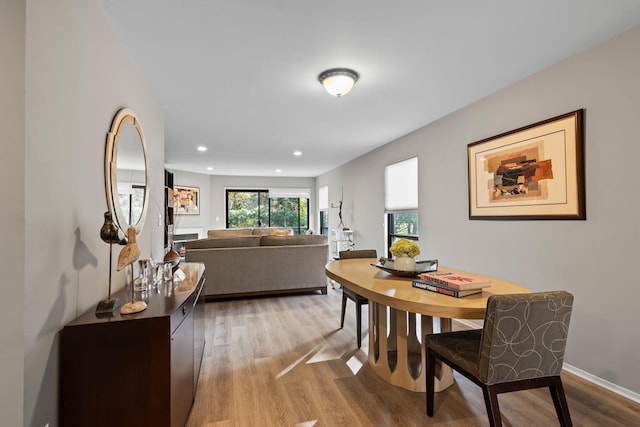 dining area featuring hardwood / wood-style floors