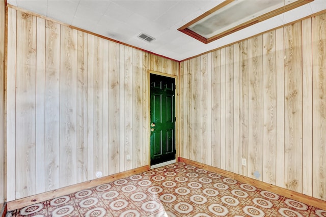 empty room with wooden walls