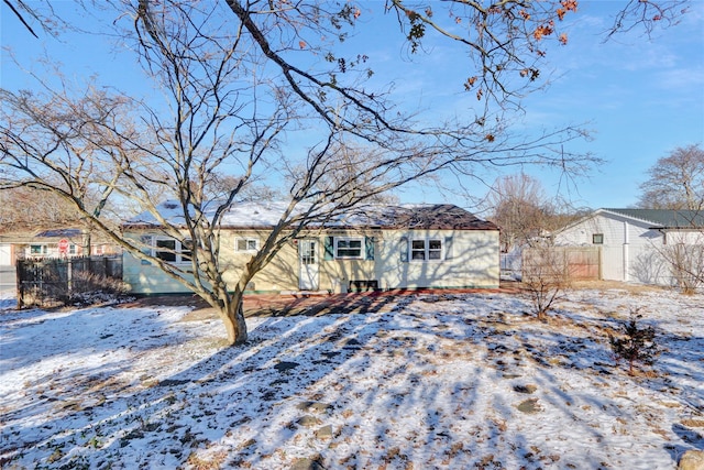 view of snow covered house