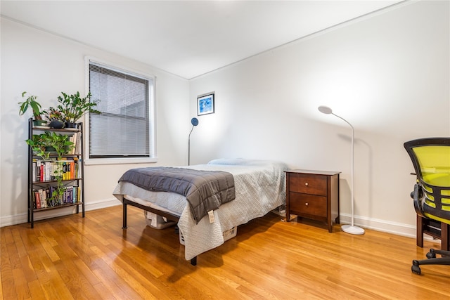 bedroom featuring hardwood / wood-style floors