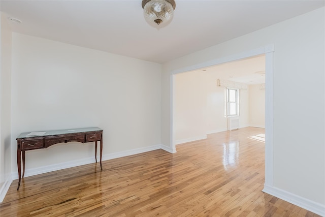 unfurnished room featuring light hardwood / wood-style floors