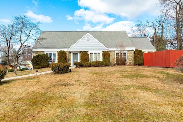 single story home with a front yard