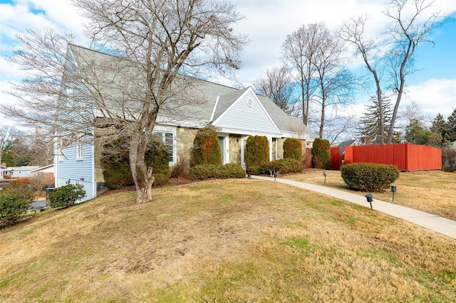 view of front of home with a front lawn