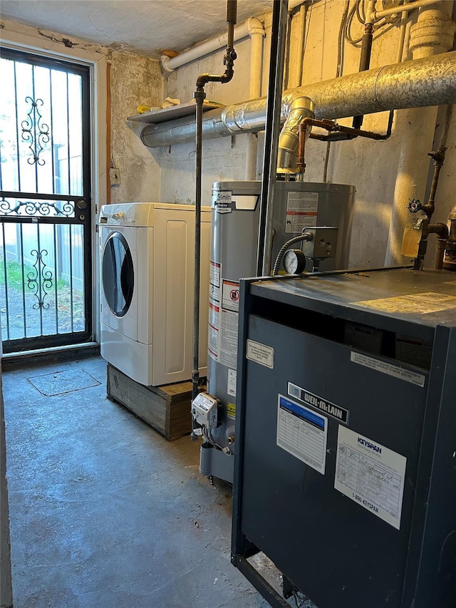 laundry area featuring washer / clothes dryer and gas water heater