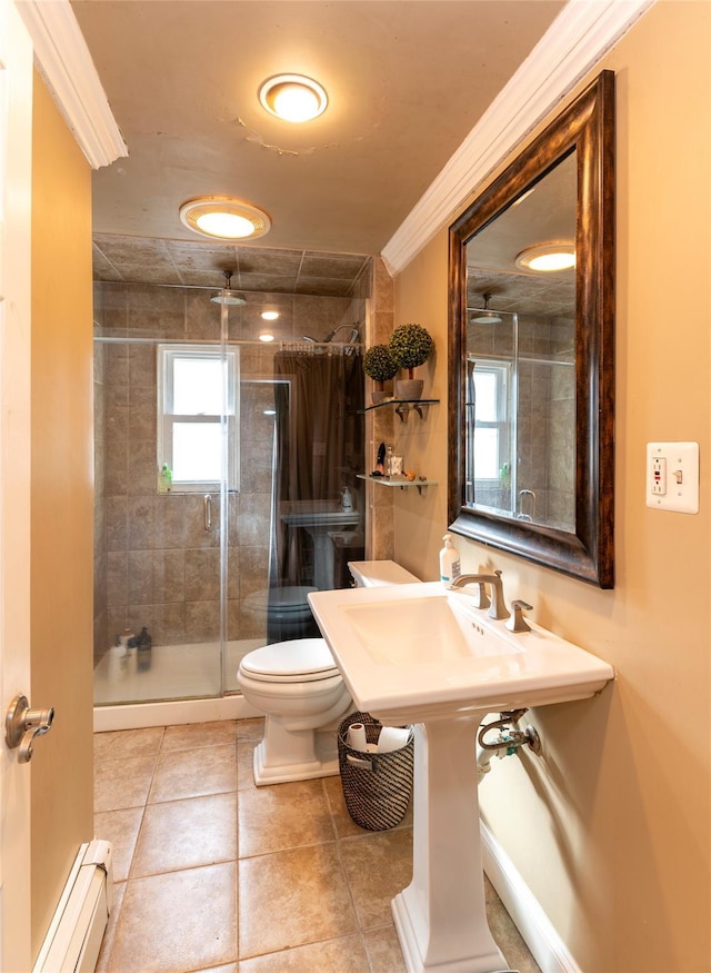 bathroom with walk in shower, ornamental molding, a baseboard heating unit, tile patterned flooring, and toilet