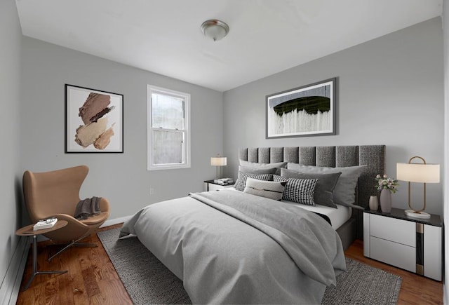 bedroom featuring wood-type flooring