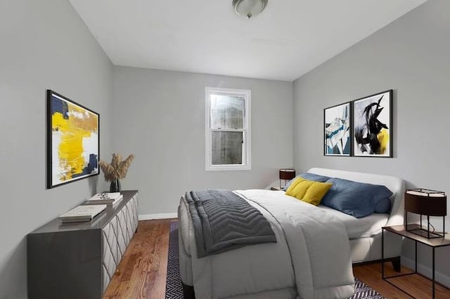 bedroom featuring wood-type flooring