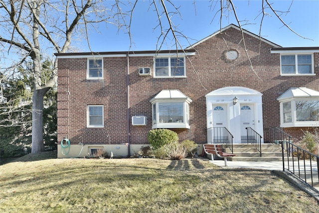 view of front facade with a front lawn