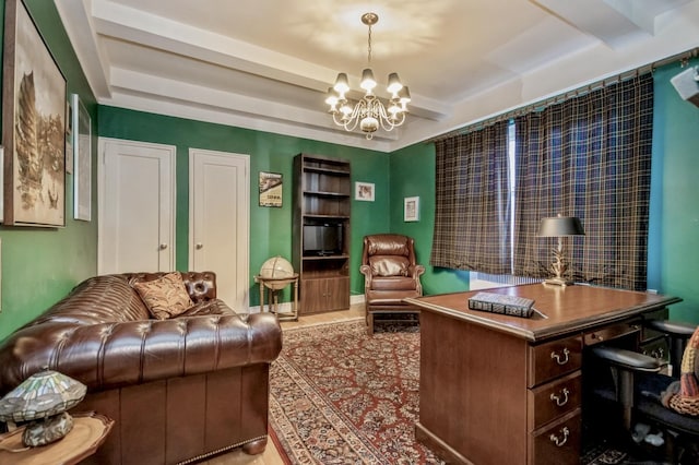 home office featuring an inviting chandelier