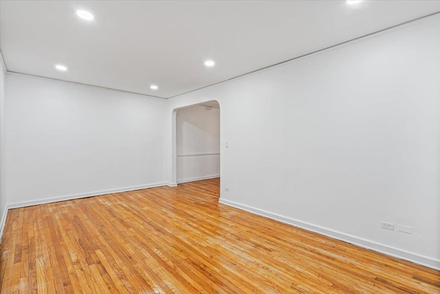 unfurnished room with light hardwood / wood-style flooring