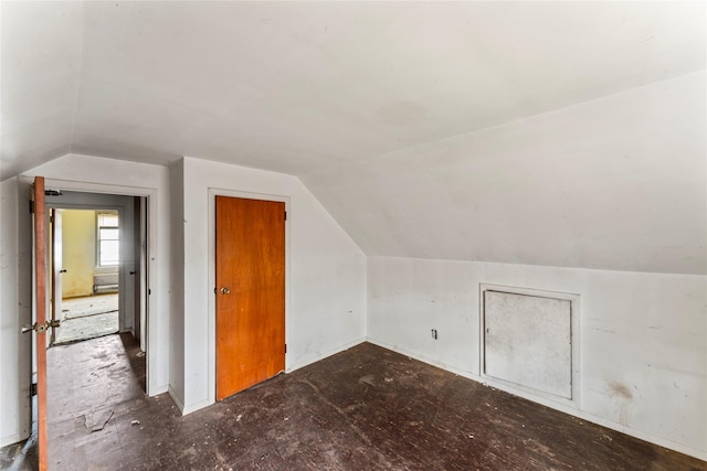 bonus room featuring lofted ceiling