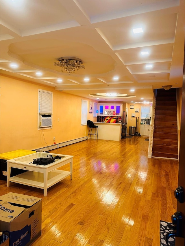 miscellaneous room with hardwood / wood-style flooring, cooling unit, baseboard heating, and coffered ceiling