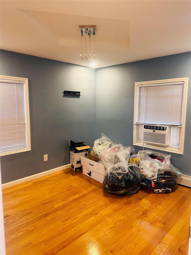 misc room featuring light hardwood / wood-style flooring and cooling unit