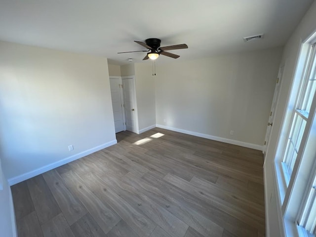 interior space featuring hardwood / wood-style flooring and ceiling fan