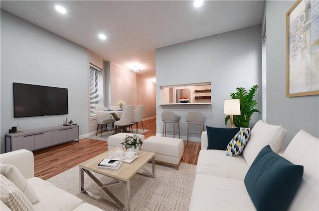 living room with light hardwood / wood-style floors