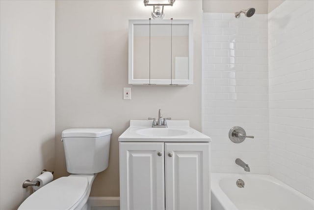 full bathroom with vanity, toilet, and tiled shower / bath