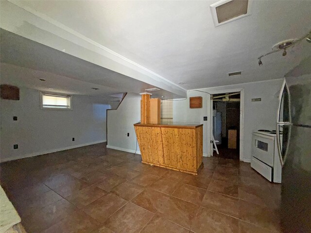 33 Birch Ct, Riverhead, NY 11901 - kitchen with electric range, freestanding refrigerator, and tile patterned flooring
