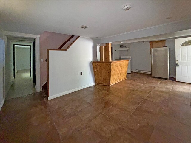33 Birch Ct, Riverhead, NY 11901 - kitchen featuring freestanding refrigerator, stove, baseboard heating, extractor fan, and a peninsula