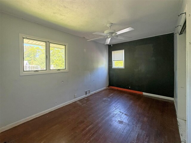 33 Birch Ct, Riverhead, NY 11901 - unfurnished room featuring wood finished floors, baseboards, and a ceiling fan