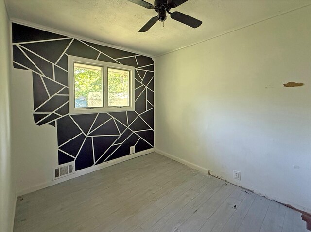 33 Birch Ct, Riverhead, NY 11901 - unfurnished room with wood finished floors and ceiling fan