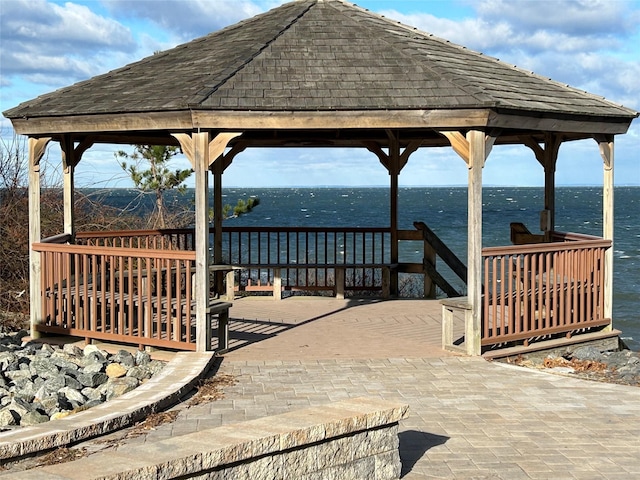 view of property's community featuring a gazebo and a water view