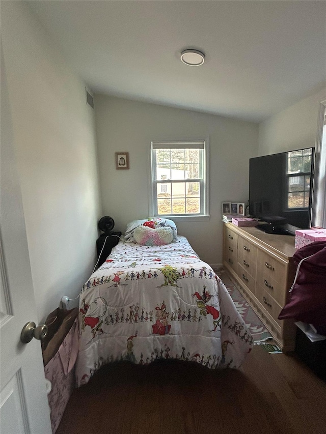 bedroom featuring vaulted ceiling