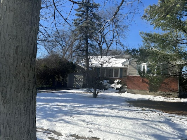 view of front of property featuring brick siding