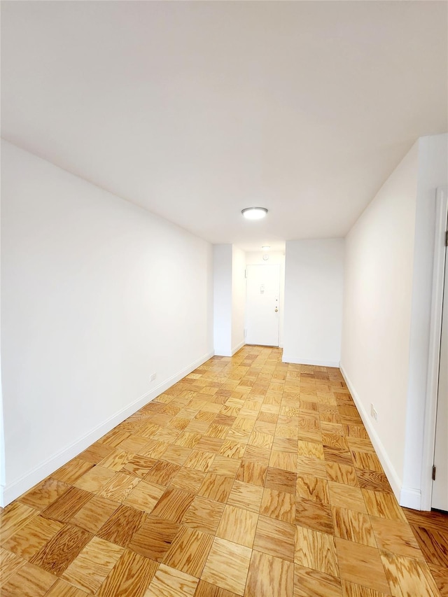 empty room featuring light parquet flooring