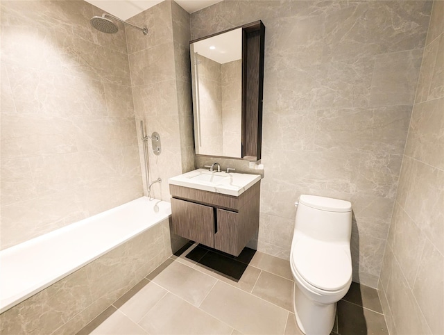 full bath with tile patterned flooring, toilet, vanity, tile walls, and tiled shower / bath