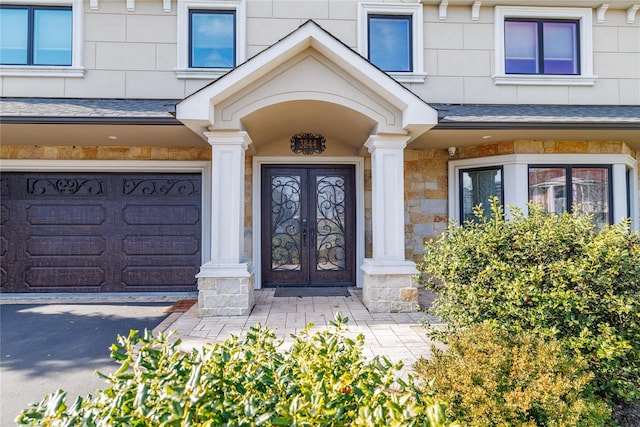 doorway to property featuring french doors