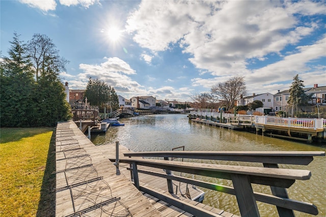 view of dock with a water view