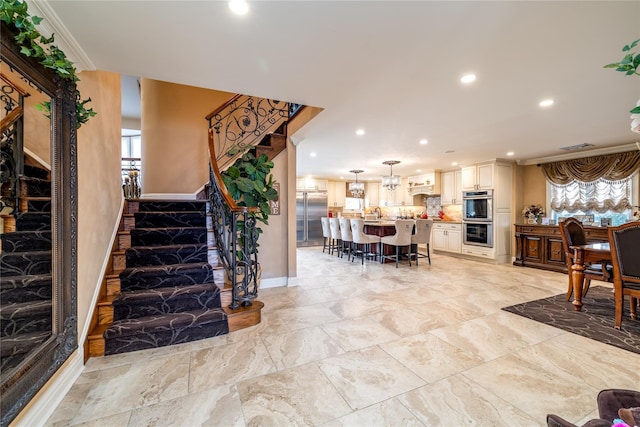 interior space with crown molding