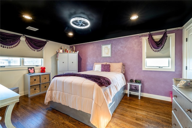 bedroom featuring hardwood / wood-style floors