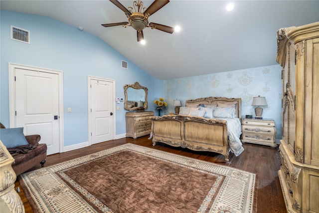 bedroom featuring dark hardwood / wood-style floors, ceiling fan, and lofted ceiling